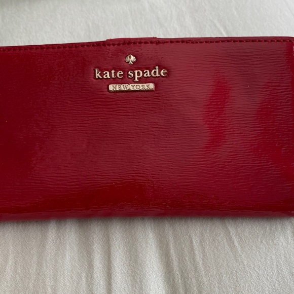 kate spade Handbags - kate spade red patent leather continental wallet with gold logo